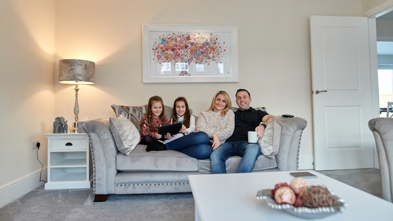 The Maule family in their new home