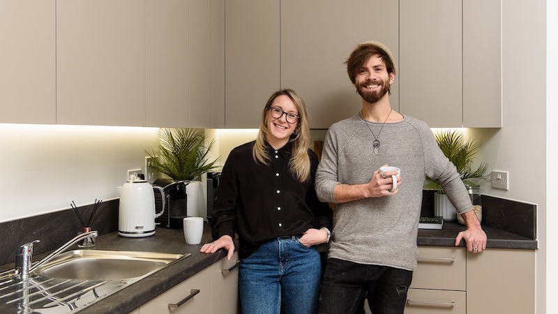 Becci and Dan in their new home